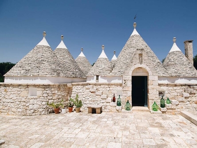 Traditional trullo with swimming pool