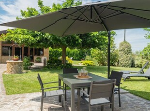 Accogliente casa a Villa Consalvi con barbecue e giardino
