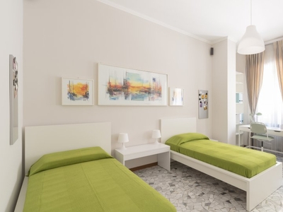 Camera con letti in affitto in appartamento con 3 camere da letto a De Angeli