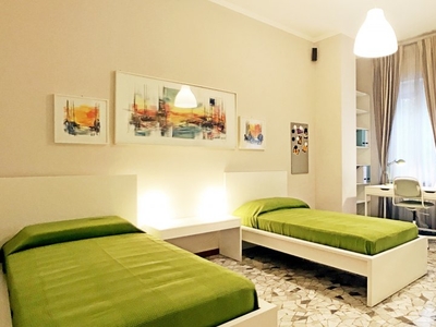 Camera con letti in affitto in appartamento con 3 camere da letto a De Angeli