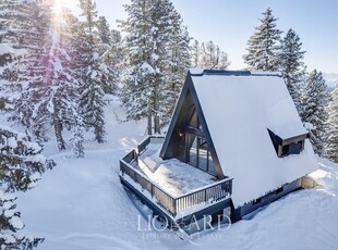 Lodge di lusso con terrazza panoramica sulla Val di Fiemme in vendita
