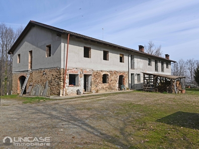 Porzione di cascinale agricolo con deposito e terreno in vendita