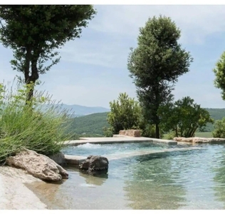 Casa Vacanze 'Borgo Mommialla Casa Alessandra' con piscina condivisa, Wi-Fi e aria condizionata