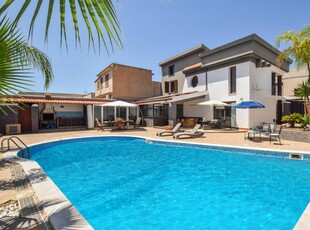 Casa a Marinella con terrazza e piscina