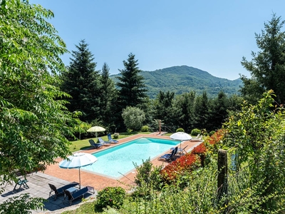 Appartamento 'Alba al Rifugio Arcobaleno' con vista montagne, piscina in comune e Wi-Fi