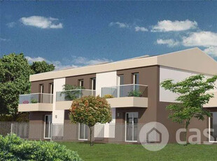 Villa a schiera nuovo con giardino privato di mq. 36 e con garage