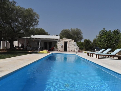 Villa With Trullo And Swimming Pool In The Middle Of Olive Trees