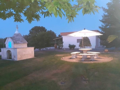 Historic villa with trulli in the Itria Valley surrounded by nature