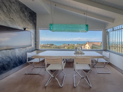 Appartamento Casa Lorenzo con vista sul mare, giardino in comune, aria condizionata e Wi-Fi