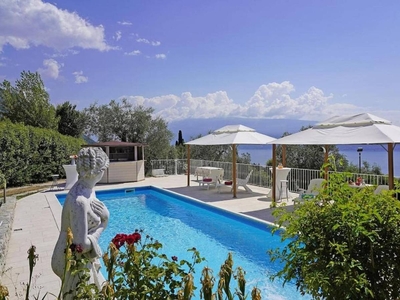 Villa 'Dei Roccoli' con vista lago, Wi-Fi e aria condizionata