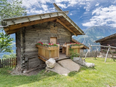 Casa con terrazza, barbecue e giardino + vista sulla montagna