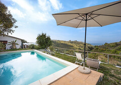 Casa vacanze Il Nido con vista mare, piscina condivisa e aria condizionata