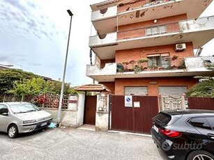 Acilia centro - bilocale con giardino privato