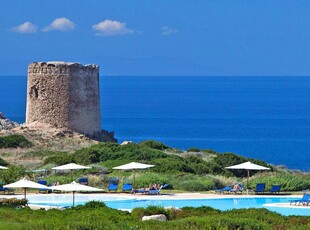 Ville Torreruja con vista mare e piscina privata a Isola Rossa